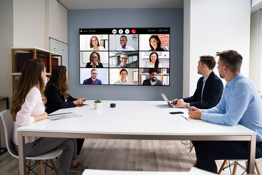 Dynamic individuals collaborating in a modern workspace, epitomizing the skills and mindset essential for 21st-century success.