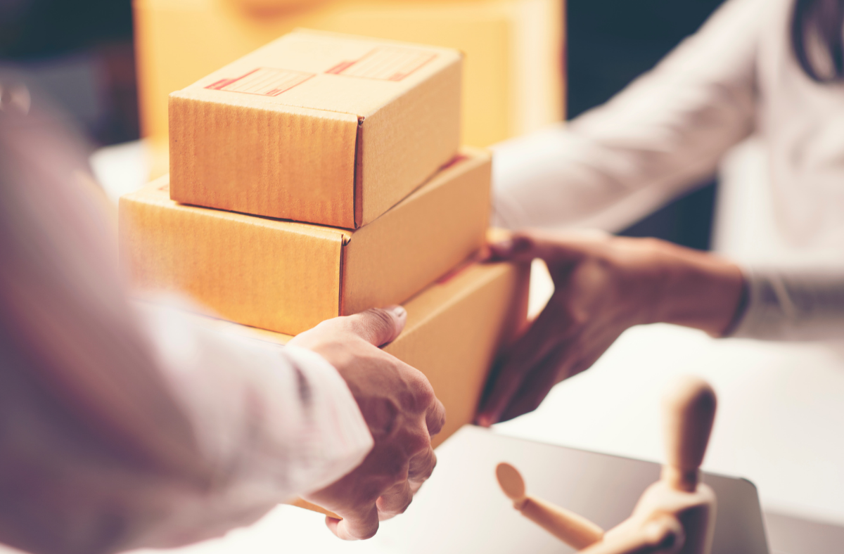 Couriers in action, highlighting the seamless sale of a courier business in South Dakota, Minnesota, Iowa, Nebraska, and Wisconsin with Meritus Group Business Brokerage.