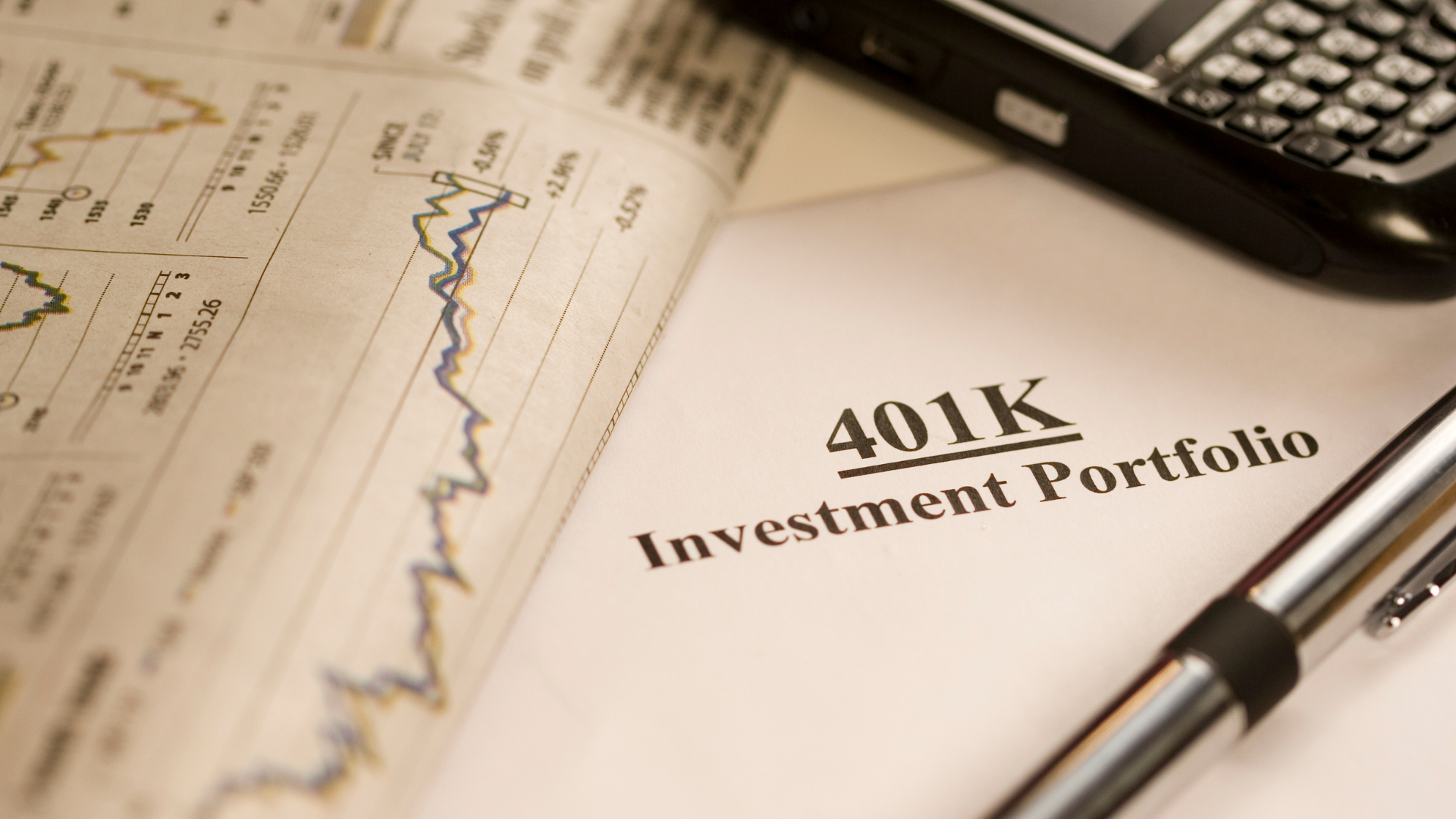 Business owner examining 401k investment plan for entrepreneurship funding.