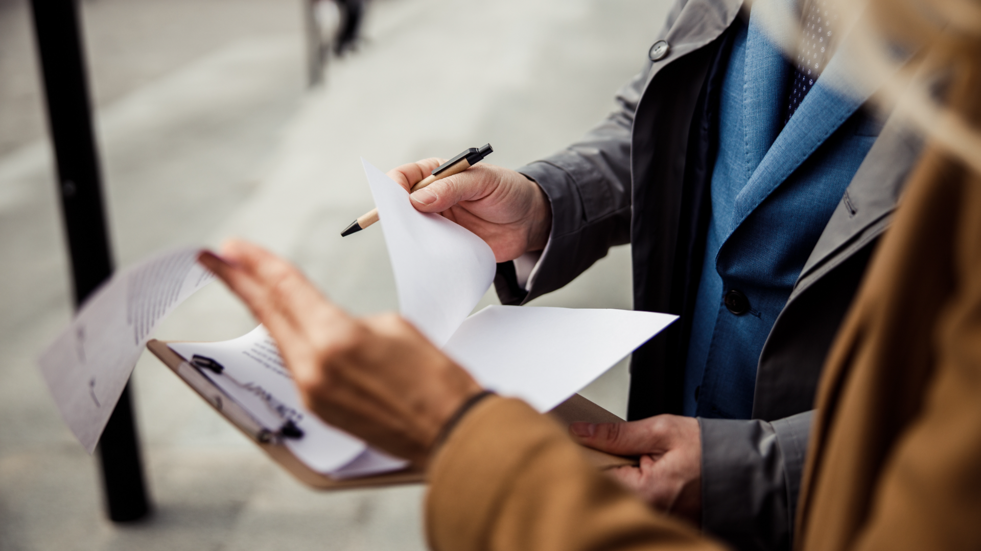Business owner presenting a well-organized business to potential buyers