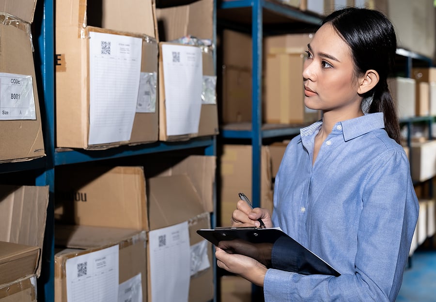 A business owner reviewing underperforming products and services, evaluating opportunities for growth or strategic removal.